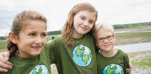 Kids in environmental earth shirts